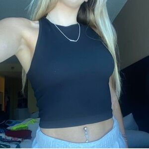 black halter tank 
size small/medium (fits more like a small)
brand: aura
